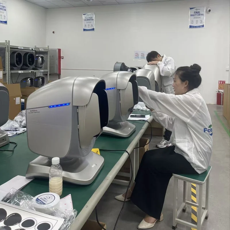 Technicians inspecting skin analyzers at quality-control workstations.
